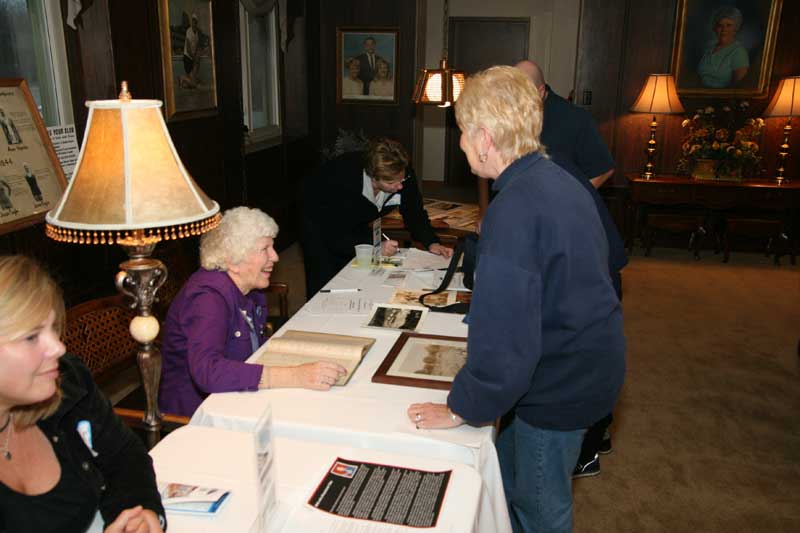 Party attendees could look up members names of friends and relatives in the handwritten 1934 membership ledger.