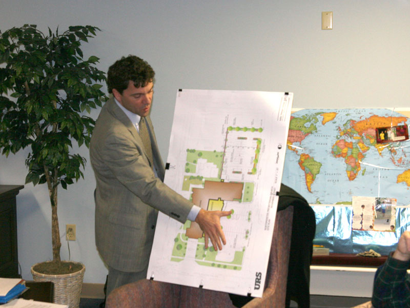 Cameron Clark shows the plan for the church