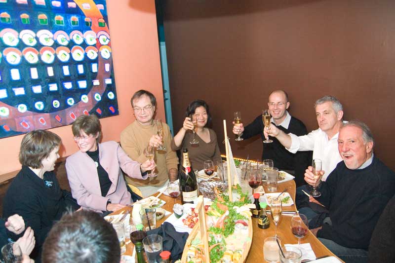 Maggie Lee (middle) toasted the table of friends at the pre-opening party