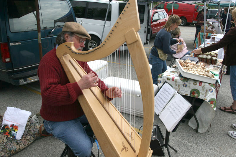 Tom Duncan played harp on May 17.