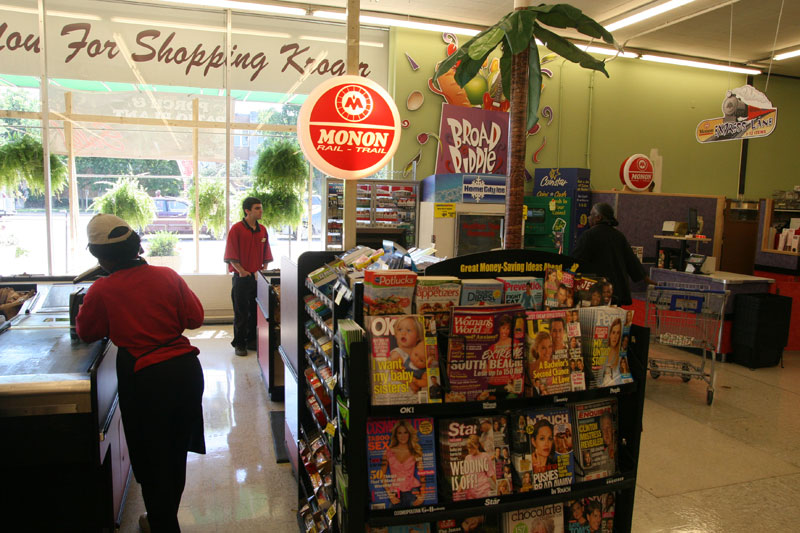 Monon rail signs light up the checkout lanes at the Broad Ripple Kroger.