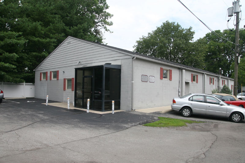 The entrance to the office is on the Carrollton Ave side, where the parking lot is located.