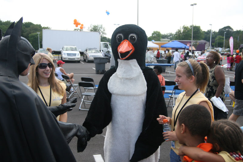 Batman shakes hands with the Penguin!