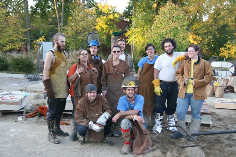 A team of 'iron workers' suited up in their protective gear before the Saturday night pour.
