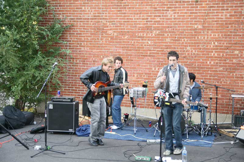 Post Script on the outdoor stage at Monon Coffee located at 920 Westfield Boulevard