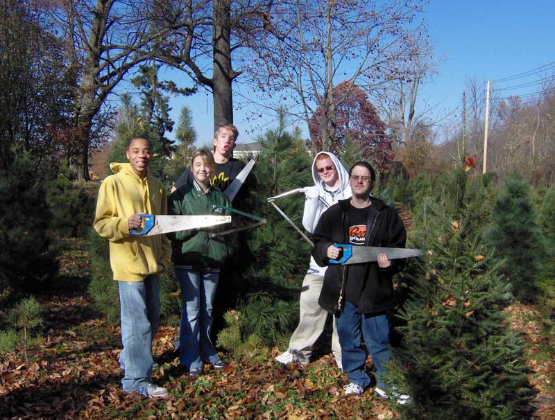ISBVI students Nicholas Buntin, James Flowers, Josh McCash, Kane Sparks and Carly Stevason in the Christmas tree field.