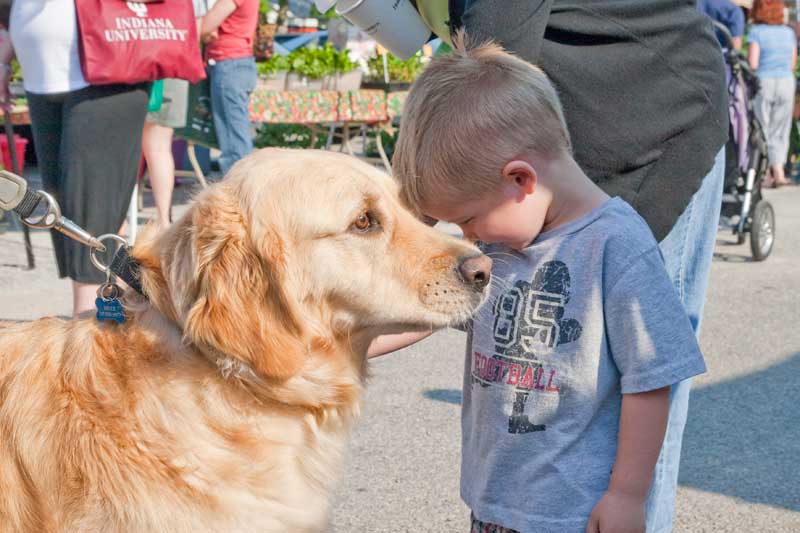 The May 23 Farmer's Market was bright and sunny. Treasures were aplenty for young and old, 2 and 4 footed.