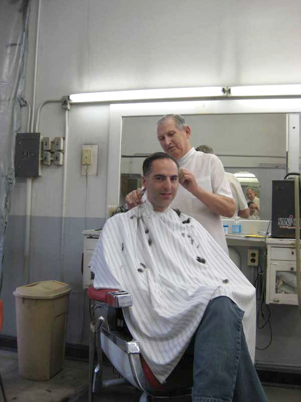Joe Huntzinger in the chair at Paul's Barbershop.