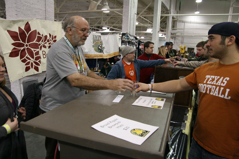 John Hill poured samples from the Broad Ripple Brewpub in the station next to Brugge Brasserie and Barley Island.