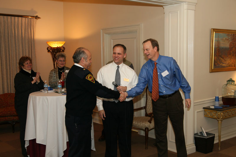 IFD Assistant Chief Dudley Taylor, Eric Bell, Manager & Funeral Director Flanner and Buchanan - Broad Ripple, and Bruce Buchanan.