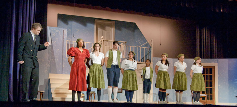 The Captain and Maria with the seven von Trapp children (in no order) - Kim Van Wyk (Liesl), Dylan Richardson (Friedrich), - Jessica Banks (Louisa), Mackenzie Ross (Brigitta), Camille Trotter (Marta), Mara Phelps (Gretl), Savon Simpson (Kurt).