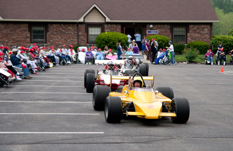 Race cars in the parade
