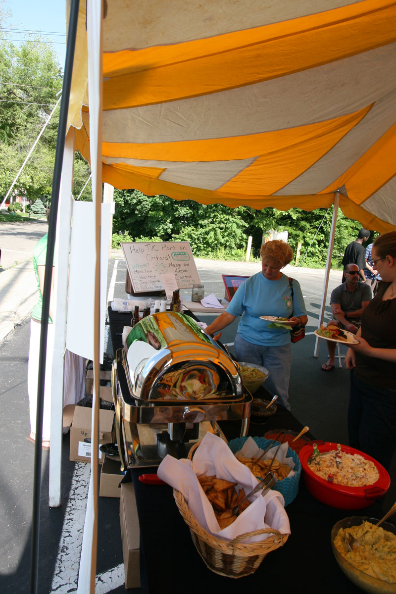 Jeanine Coley samples the hors d'oeuvres at the celebration