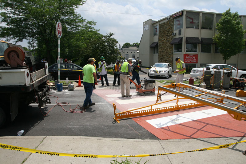 Random Rippling - Last portion of crosswalk completed on the Avenue