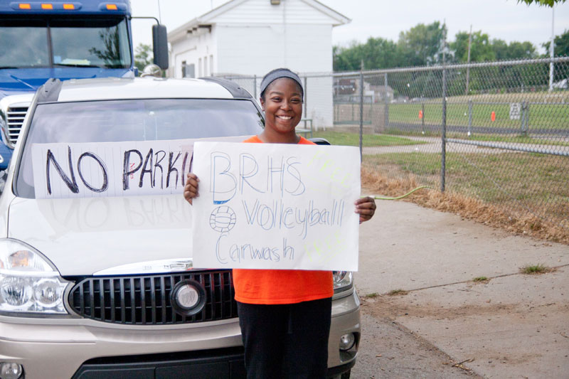 The BRHS Girls Volleyball team washed cars as a fundraiser