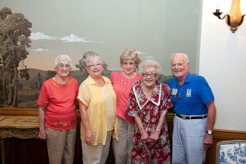 Mary Dorney (2nd from left) and OASIS volunteers Virginia Link, Nancy Zimmerman, Rowena Bush, and Bill Reed at the Broad Ripple Flanner and Buchanan location.