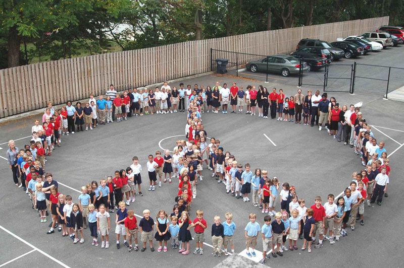The Center for Inquiry at School 84, 57th and Central Avenue, recently celebrated the International Day of Peace. At CFI/84, students created a giant peace sign as seen here from the roof of the school. CFI/84 is also participating in Pennies for Peace, raising money to help build schools in Pakistan and Afghanistan. www.penniesforpeace.org