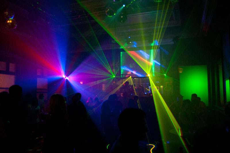 Laser light show accompanying the DJs inside at TRU.