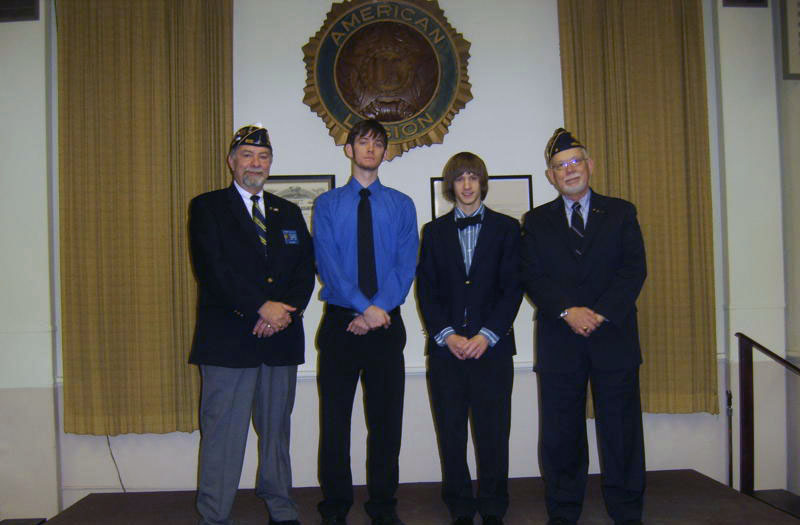 Pictured are Mark Gullion, district commander, contestants Ronald F. Taylor and Austin Ryan, and Rees Morgan, post commander.