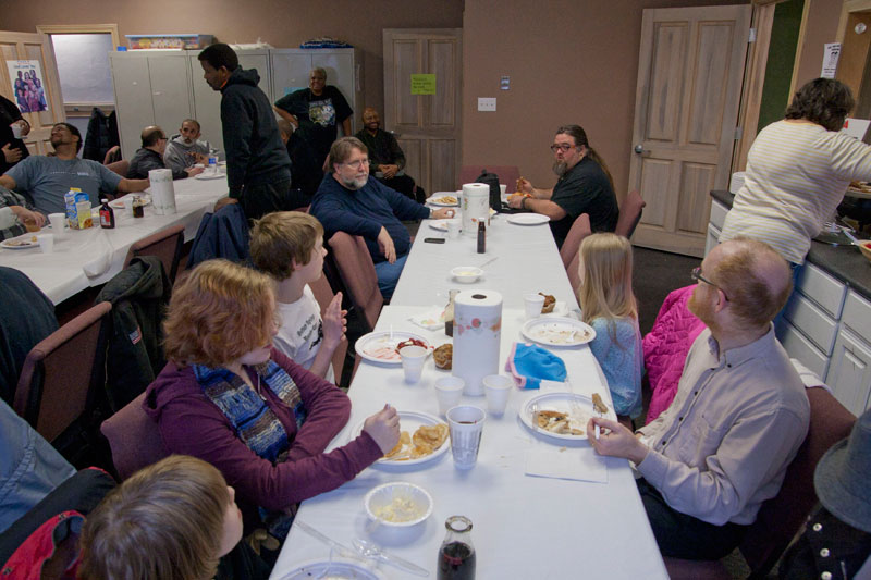 Seated at the far end of the table are pastor Jerry Sizemore (left) and Maria Project leader Danny Wright (right).