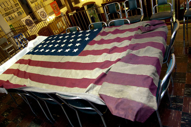 An 1876 38 star ceremonial flag on display on the upper level at the Post. The 12 foot flag was used to cover the coffins of military personnel at Union Chapel Cemetery. The flag's restoration and preservation is under the care of Post member George Kerr.