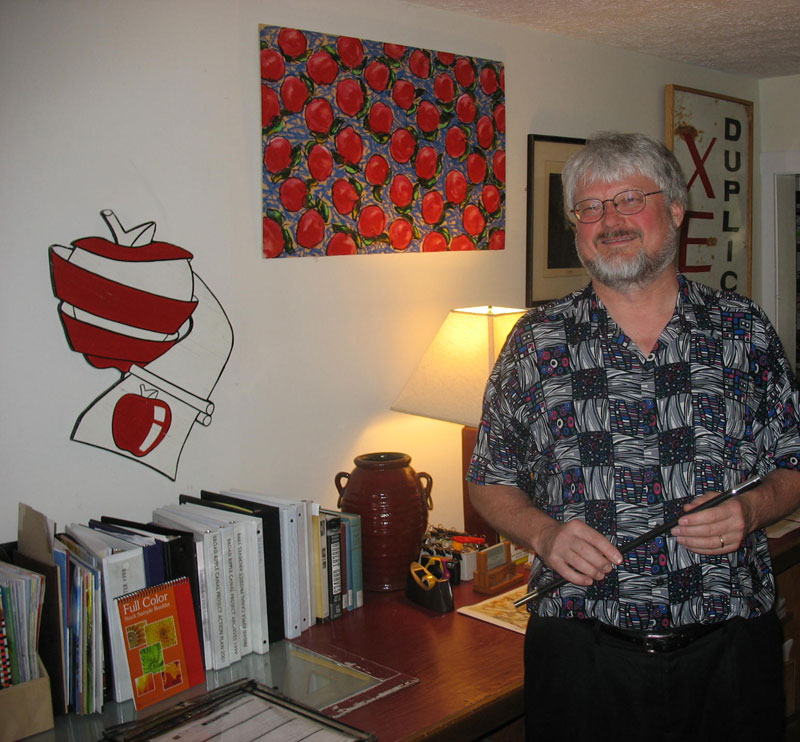 Tom Healy in the Apple Press office at 6327 Ferguson Street.