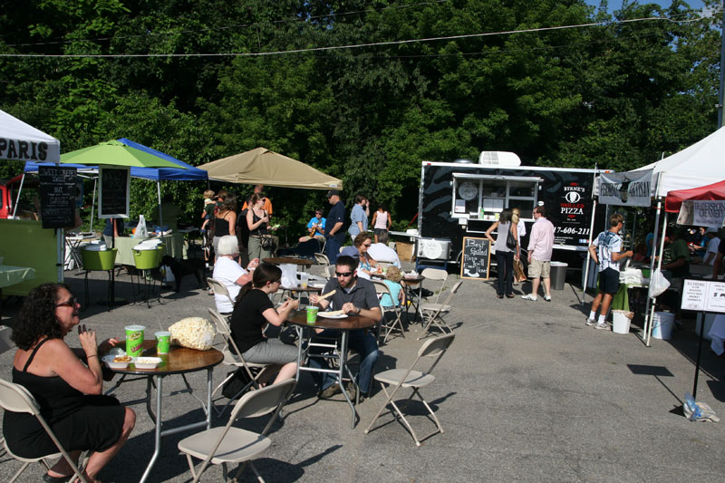 outdoor dining area at the Wednesday evening market at Broad Ripple Park