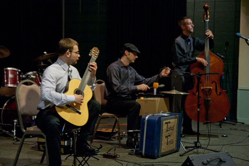 Tonos Triad's drummer played the cardboard box and suitcase.