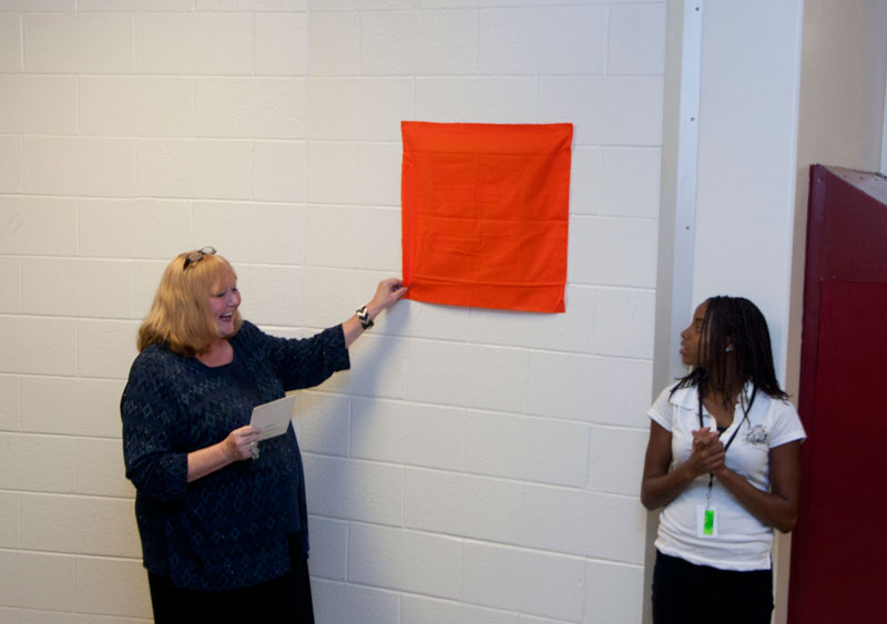 BRHS Principal Linda Davis unveils the plaque