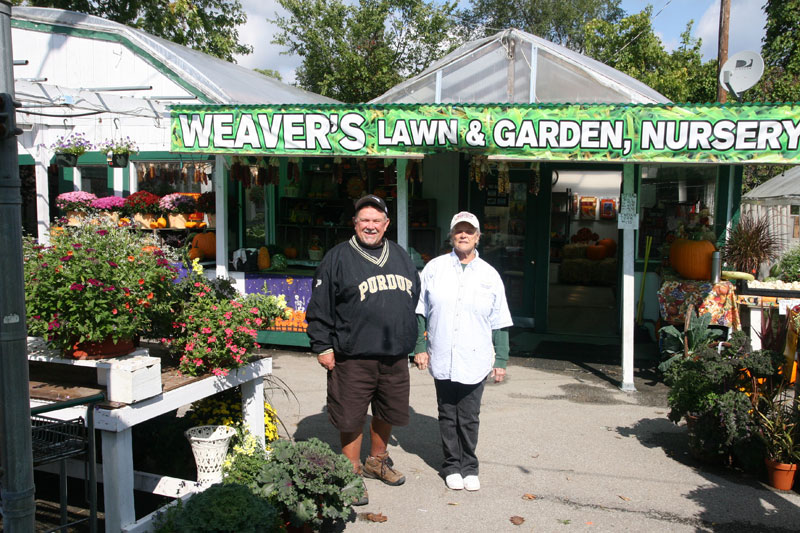 Brother and sister, Tom and Pam, at Weaver's Lawn and Garden on the river.