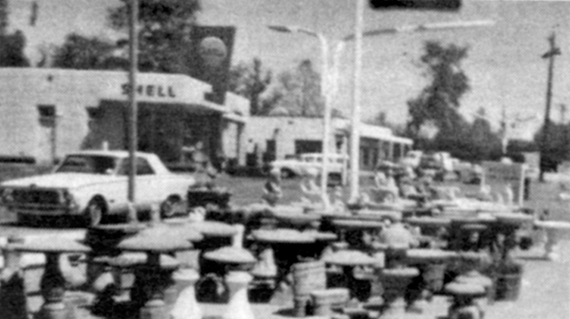 From the 1960s: Fountains and bird baths in front of Weaver's. Note that next to Weaver's was a Shell station.