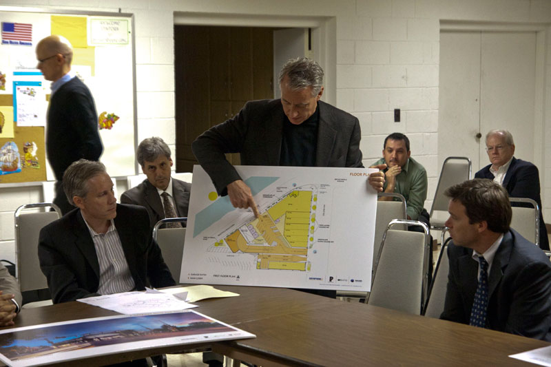 The plan for the parking garage is explained to the committee.