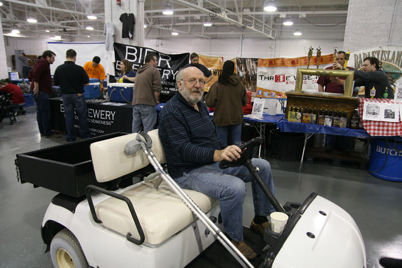 John Hill, owner of Broad Ripple Brewpub, rode around the fest in style while recovering from an injury during a trip to New Zealand.