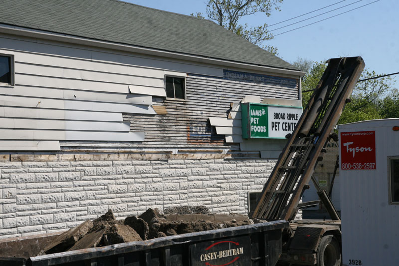 A bit more of the old painted sign on the south side of the building was revealed.