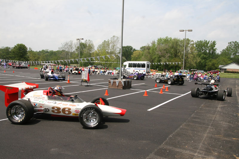 The Indy 500 Shriner's Club midget race cars in the parade