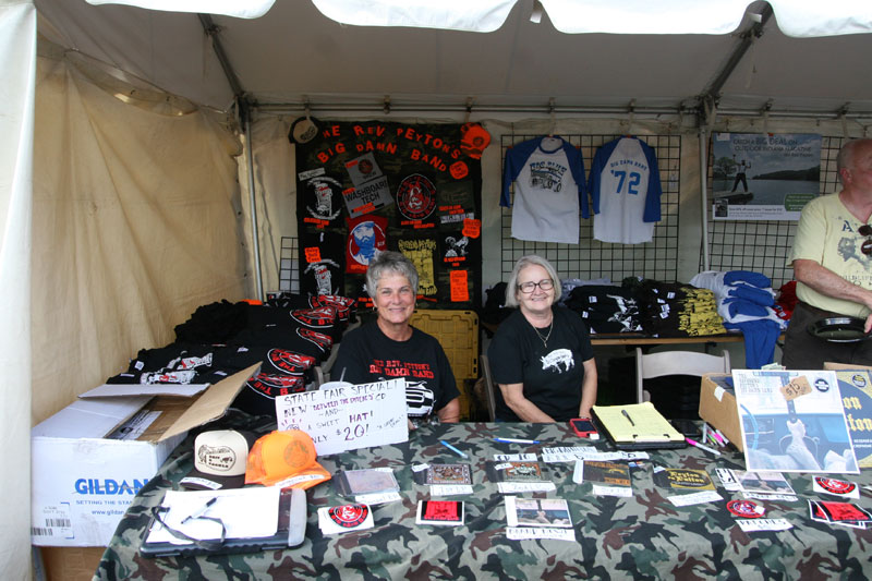 The moms ran Rev. Peyton's Big Damn Band merch tent at the Fair.