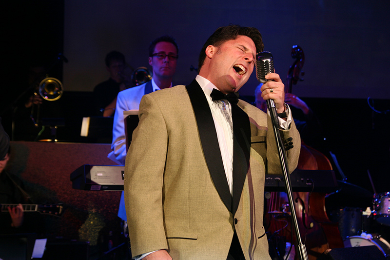 Emcee Mike Wiltrout with the Leisure Kings Big Band.