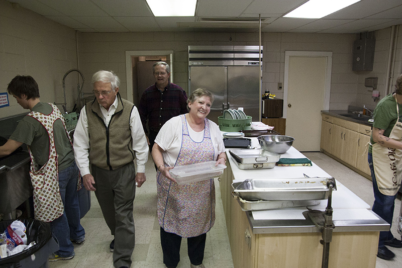 Event organizer Cathy Todd in the busy church kitchen.