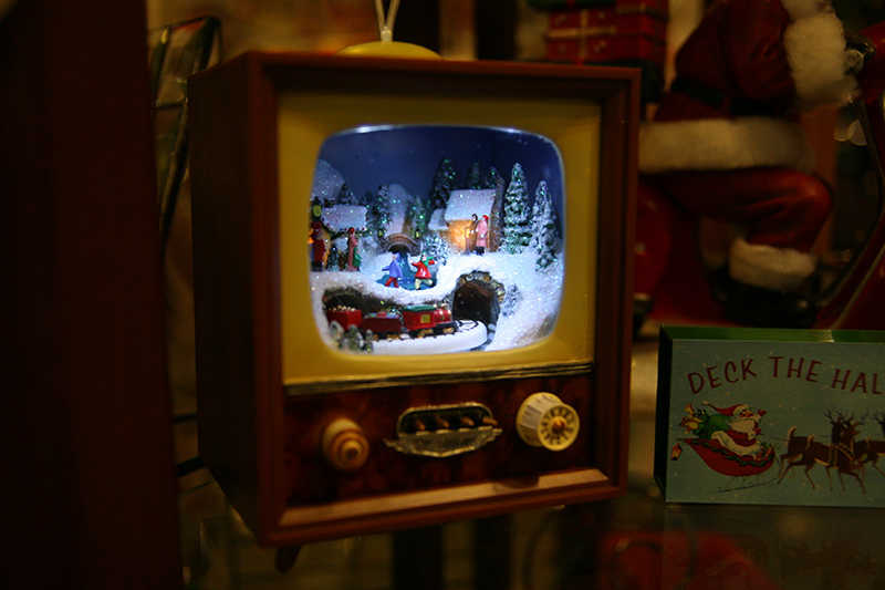 A miniature Christmas scene in a TV ornament at Chelsea's