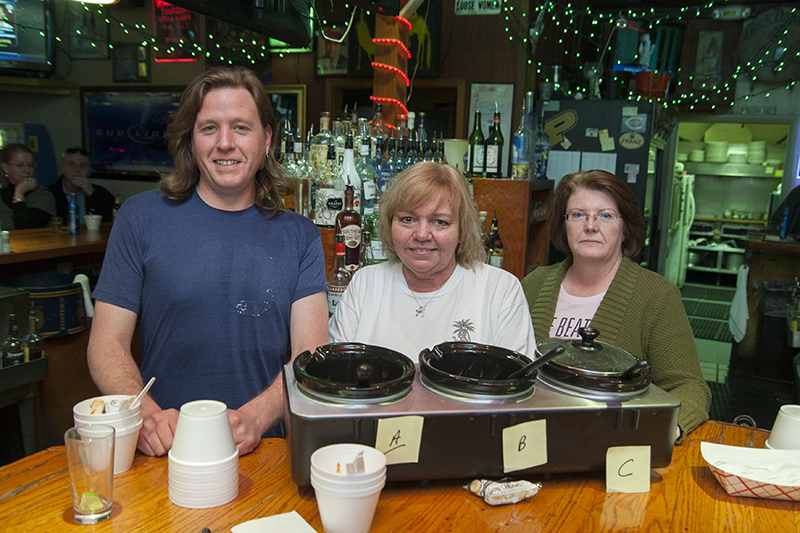 The top three finishers in the 2013 Alley Cat Chili Cookoff: Nick Tully, Teresa David, and Amy Kelley.