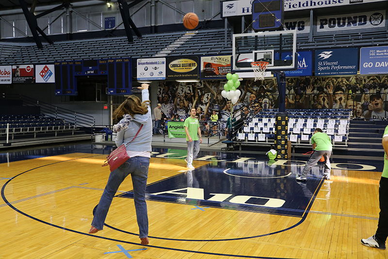 Random Rippling - Northside residents shot hoops on famous hardwood during Angie's List party