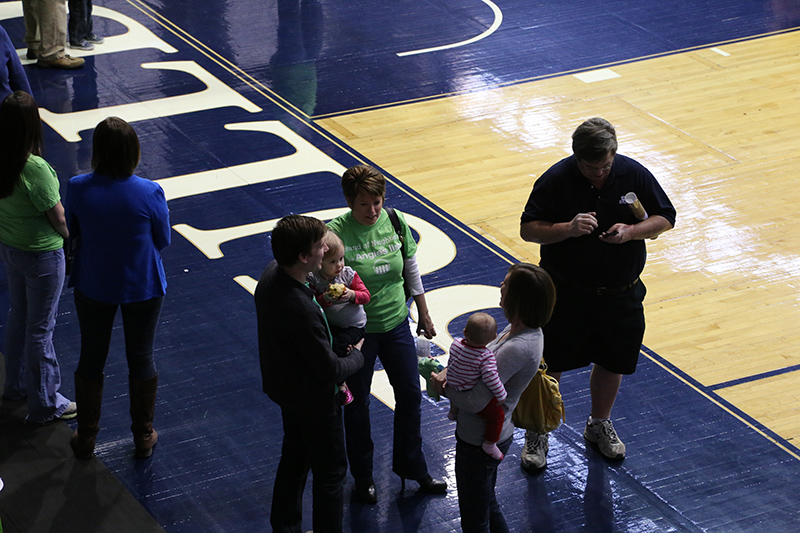 Random Rippling - Northside residents shot hoops on famous hardwood during Angie's List party