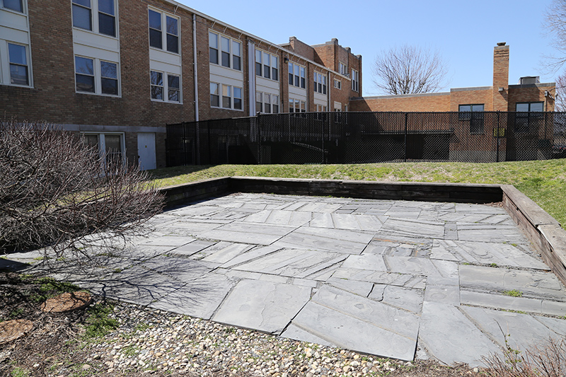 This patio is made from the chalkboards from the classrooms
