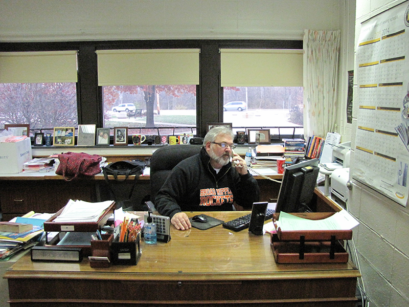 Broad Ripple Magnet High School Principal Mike Akers during a busy day in his office. 