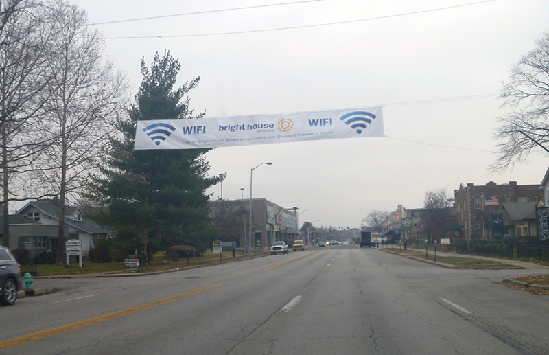 A banner above College Avenue letting residents know about the new WiFi service.