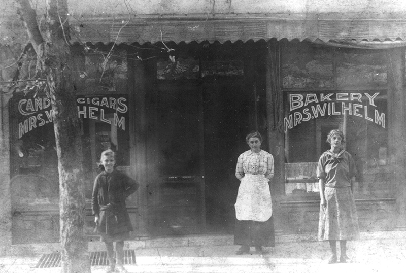 Mrs. Wilhelm's store in Brookville, Indiana around 1913. Mrs. Wilhelm is pictured with her daughters.