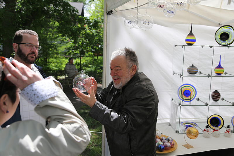 Reinhard Herzog glass art captures what appear to be exploding stars in delicate glass spheres.