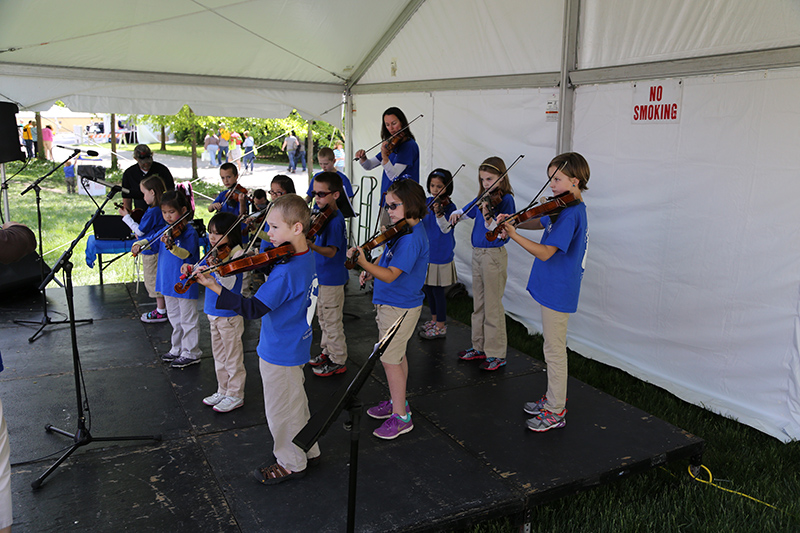 Indy Suzuki Academy performed on the violin.