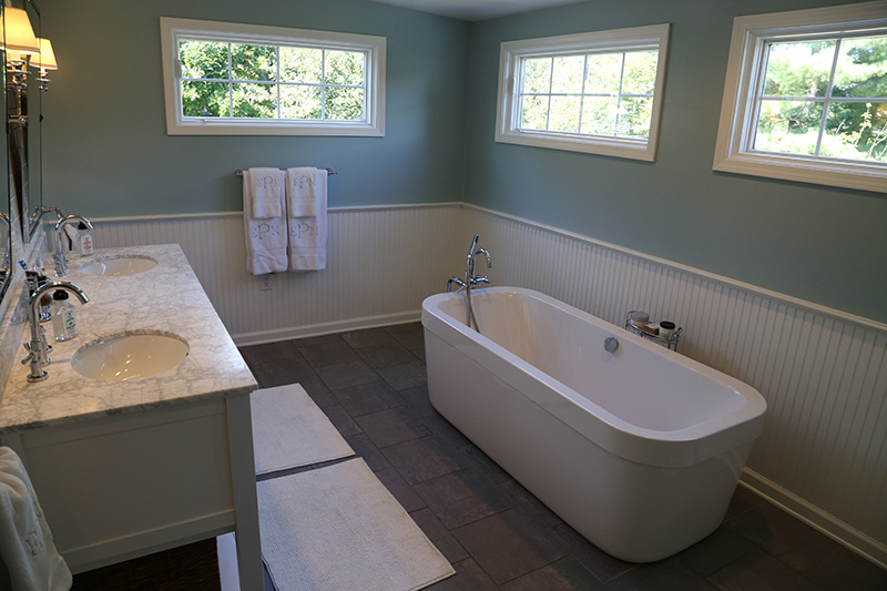 The Augustus - Patterson Home at 122 E. 61st Street features a light-filled, artistic bathroom upstairs.