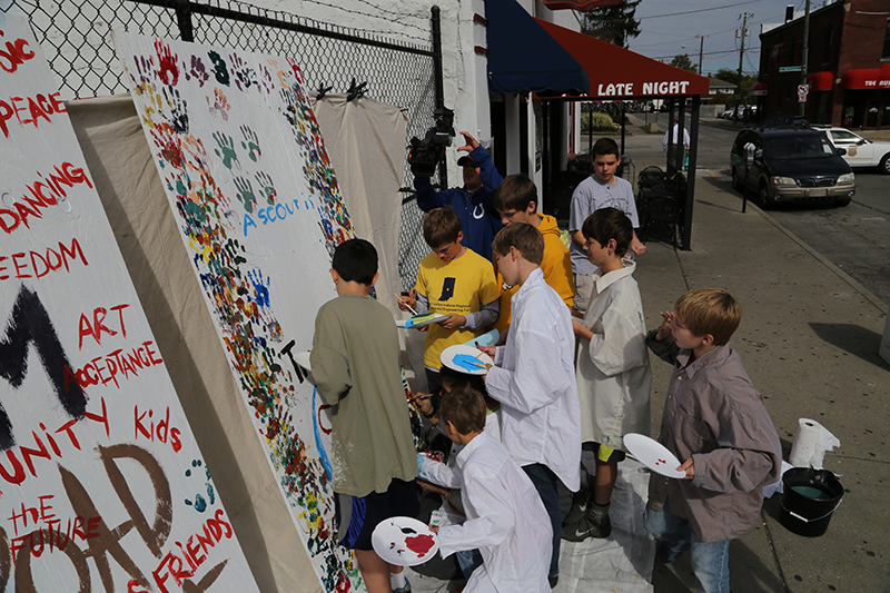 One of the events in the Kid Zone - painting a mural